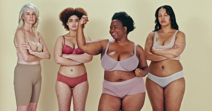 Body positive group, arms crossed or strong black woman flex muscle for diversity, equality and curvy pride. Women empowerment, shape size portrait or confident underwear friends on studio background