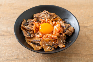 pork bulgogi rice bowl with kimchi and Korean pickled egg