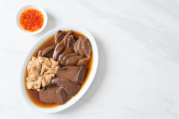 stewed duck offal in brown soup