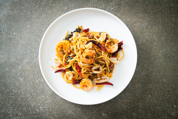 spicy spaghetti seafood on plate