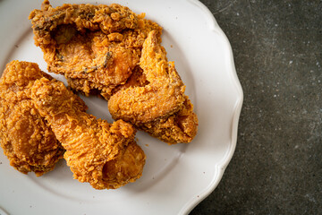 fried chicken with ketchup on plate