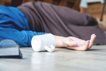 woman accident fainting and falling on the floor caused by syncope , hypotension or heart condition...