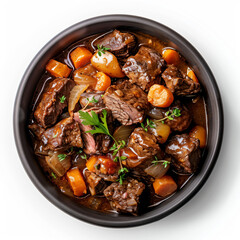 a bowl of stew with carrots and meat