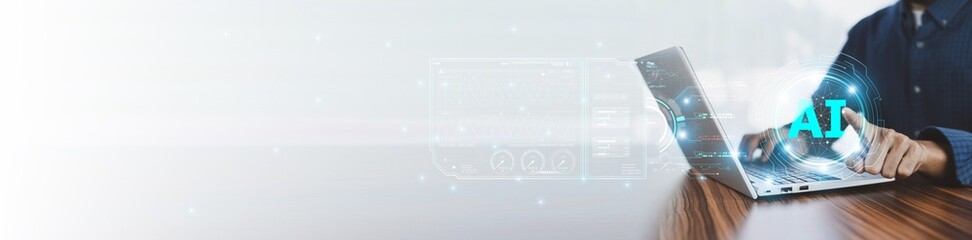 Closeup hand using computer laptop with futuristic digital interface displaying AI technology, symbolizing the integration of artificial intelligence in modern business solutions.