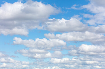White clouds against a blue sky