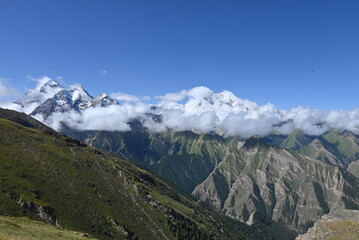 landscape of mountain  with clouds and snow