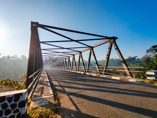 Image of a former railway bridge used as a public road during the day