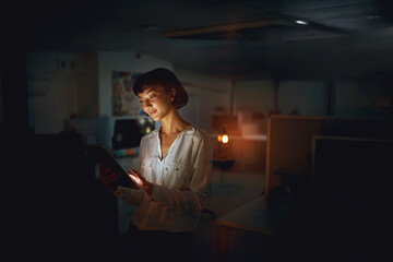 Employee, dark and business with woman, tablet and happy with project, deadline and schedule....