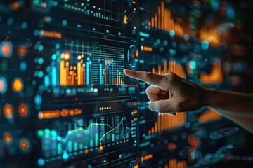 Obraz premium Hand pointing at data on digital screen