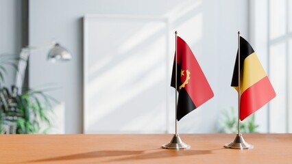 FLAGS OF ANGOLA AND CHAD  ON TABLE