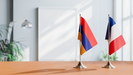 FLAGS OF ARMENIA AND FRANCE  ON TABLE