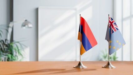 FLAGS OF ARMENIA AND TUVALU  ON TABLE