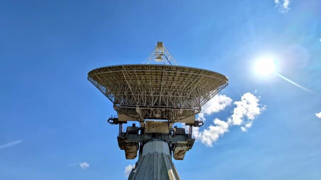 Low angle shot of RT-32 telescope on a bright sunny day in Irbene, Latvia.