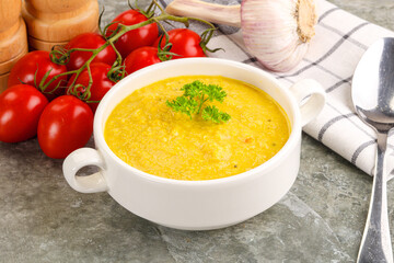 Vegetarian corn cream soup served parsley