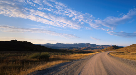 A road winds its way through a wilderness landscape setting. With copy space.