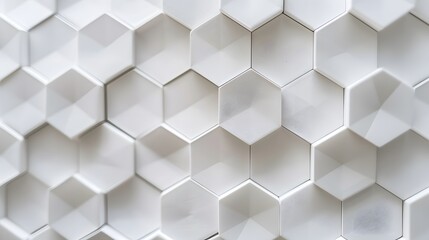 Fototapeta premium Close-up of a white hexagon background, highlighting the precise geometric arrangement and minimalistic style of the honeycomb pattern.