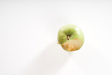 Green apple bitten