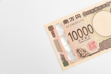 Front view of Japan's new 10,000 yen banknote isolated on white background