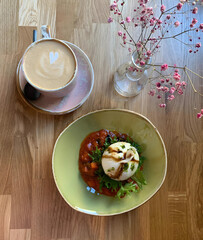 Strachattela salad and coffee, top view. 