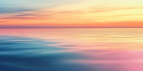 Obraz premium Macro shot of a colorful sunrise over a calm sea, highlighting the stunning transition of colors and the beauty of early morning landscapes