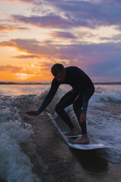 Man wakesurfing in the lake.