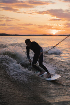 Man wake surfing in the lake.