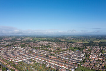 Aerial drone photo of the British town of Harrogate in North Yorkshire England which is east of the Yorkshire Dales in the summer time showing streets of residential housing estates from above