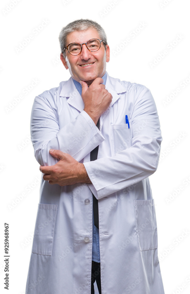 Wall mural Handsome senior doctor, scientist professional man wearing white coat over isolated background looking confident at the camera with smile with crossed arms and hand raised on chin. Thinking positive.