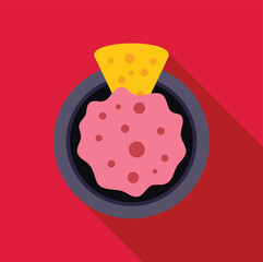 Bowl of pink dipping sauce with a tortilla chip dipped in it