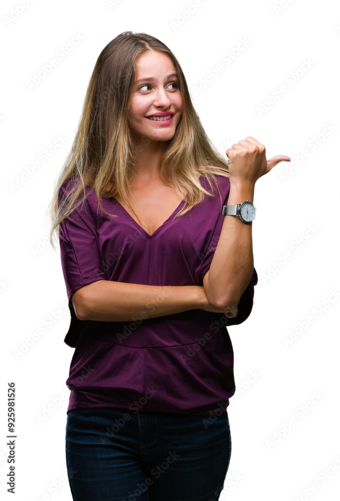 Poster Young beautiful blonde elegant woman over isolated background smiling with happy face looking and pointing to the side with thumb up.