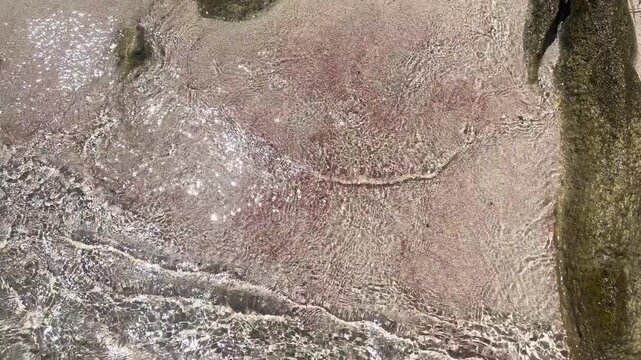 beach with red coral sand in San Vito lo Capo in Sicily. High quality 4k footage