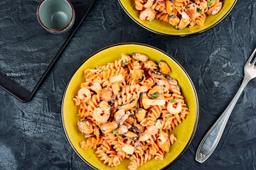 Pasta with mussels and shrimp.