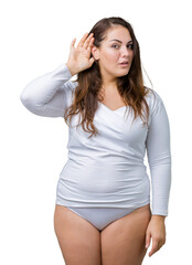 Beautiful plus size young overwight woman wearing white underwear over isolated background smiling...