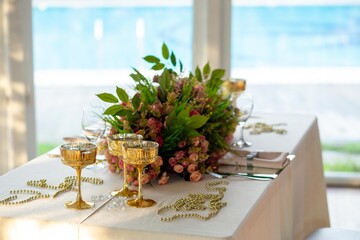 Luxury Wedding Venue: Beautifully Decorated Indoor Space with Floral Arrangements