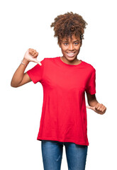 Beautiful young african american woman over isolated background looking confident with smile on face, pointing oneself with fingers proud and happy.