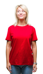 Fototapeta premium Young beautiful blonde woman wearing red t-shirt over isolated background smiling looking side and staring away thinking.