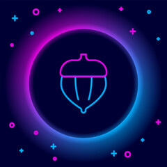 Glowing neon line Acorn icon isolated on black background. Colorful outline concept. Vector
