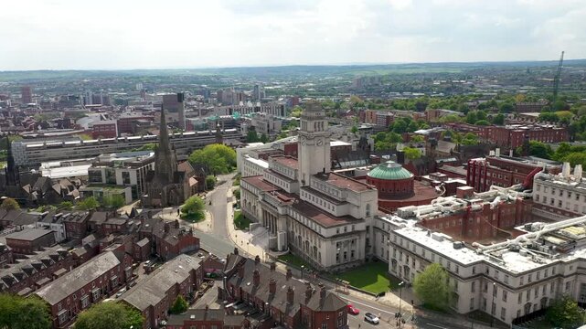 Aerial footage of the Leeds town of Headingley, the footage shows the famous Leeds University campus and The Parkinson Building and the town city centre on a bright sunny summers day