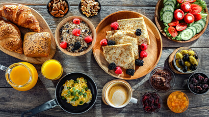 Breakfast served with coffee, eggs, cereals nd croissants
