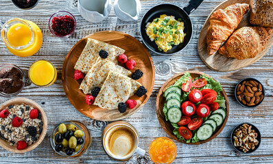 Breakfast served with coffee, eggs, cereals nd croissants