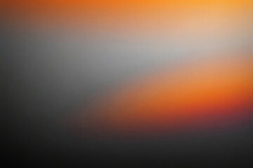 Abstract color gradient film grain texture background,gradient texture for web banner and hot sale, blurred orange gray white free forms on black, noise texture effect