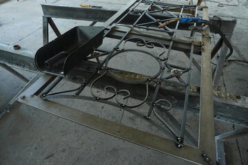 Forged gates created by a master. Made of durable metal carefully processed and welded with high skill. The gates are decorated with exquisite patterns of curls floral motifs and geometric elements.