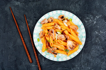 Octopus cooked with macaroni.
