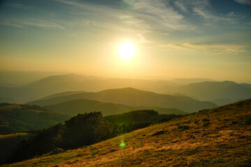 Deep yellow sunset over Valnerina mountains, Umbria, Italy