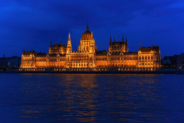 Hungarian Parliament Building at Night with River Background