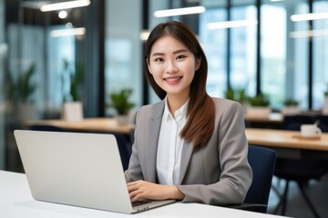 Taiwanese Woman laptop computer portrait.