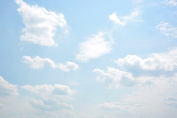 Bright blue sky with white clouds