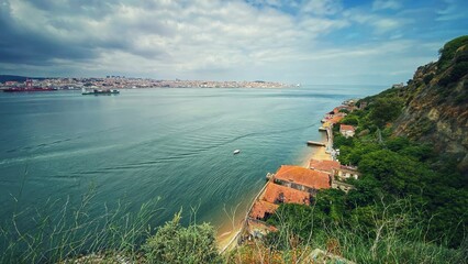 view of the coast of the city of Almada taked from the Elevator do Cristo Rei 
