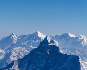 Aerial photo from a tourist plane of a majestic Gauri Shankar - Holy Mountain in the Himalayas, Nepal
