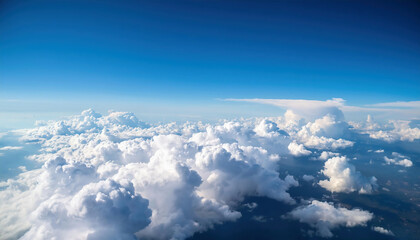 clouds in the blue sky, view from airplane window,